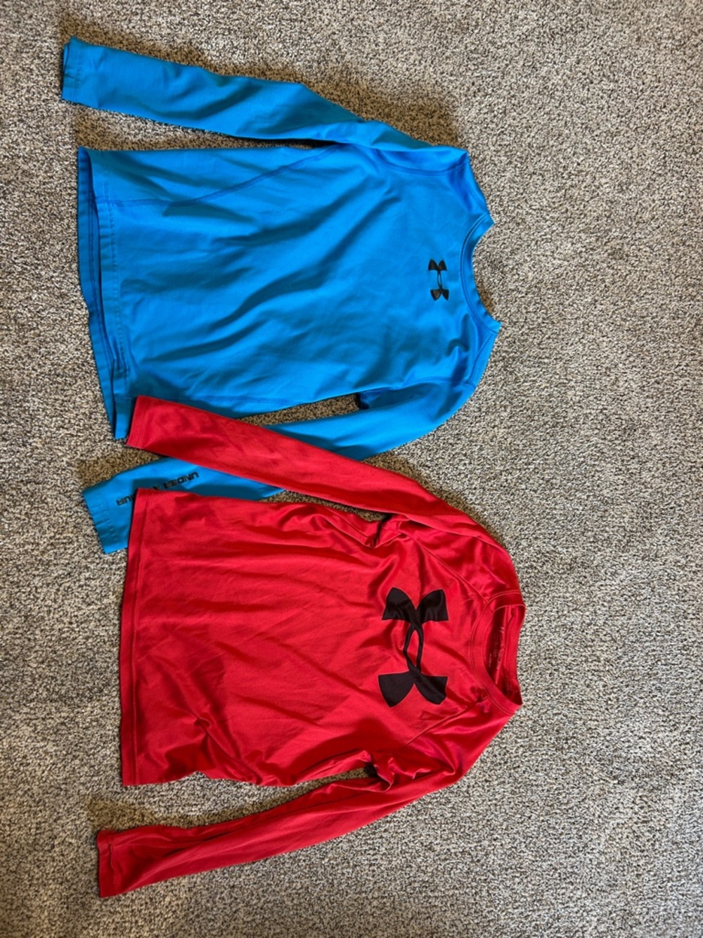 2 Under Armour Blue and Red Long-Sleeve Performance Tops